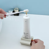 Dispensador de Creme Dental